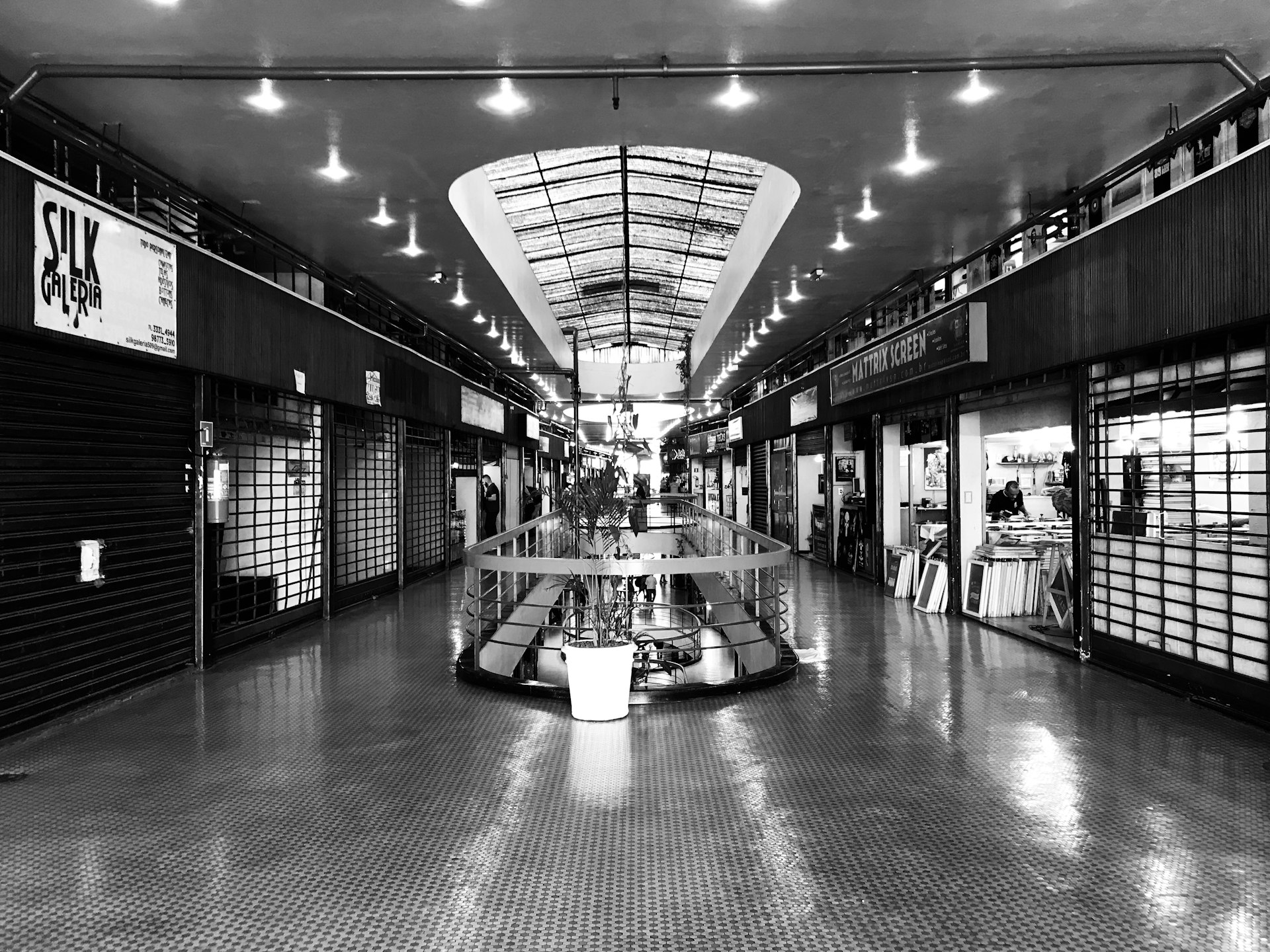 grayscale photo of a hallway